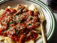 Braised Lamb Ragù with Rigatoni