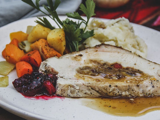 Holiday Sliced Roast Turkey Breast with Winter Fruit Stuffing Dinner